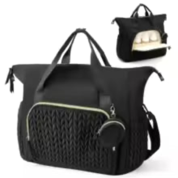 Sac à langer luxueux noir avec compartiment bouteille ouvert