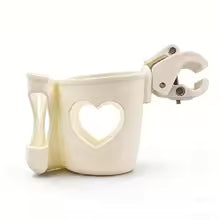 support pour poussette biberon ou tasse avec emplacement cellulaire motif coeur couleur beige