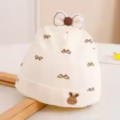 Bonnet bébé motif boucles