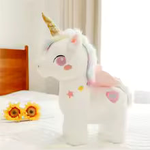 Peluche licorne blanche avec partie rose
