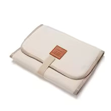 Tapis à langer nomade | Compact et Hygiénique