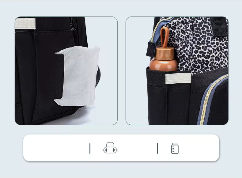 Vue des pochettes sur le coté du sac à langer lit